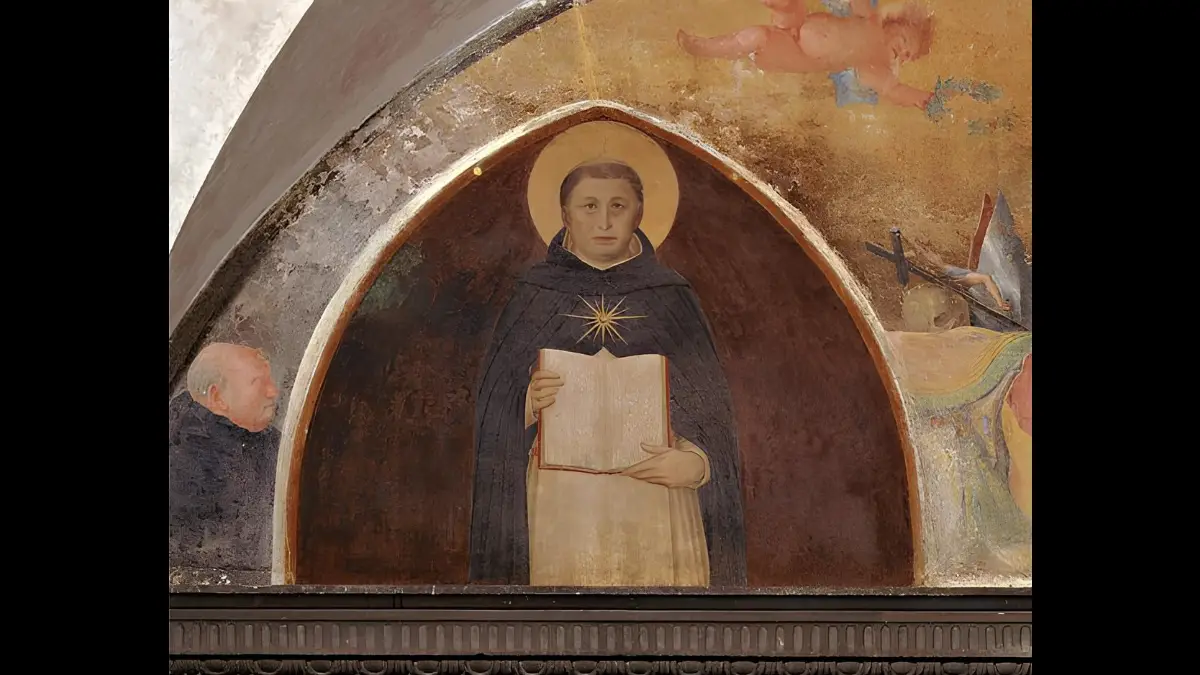 San Tommaso di Aquino mostra la Summa Theologiae